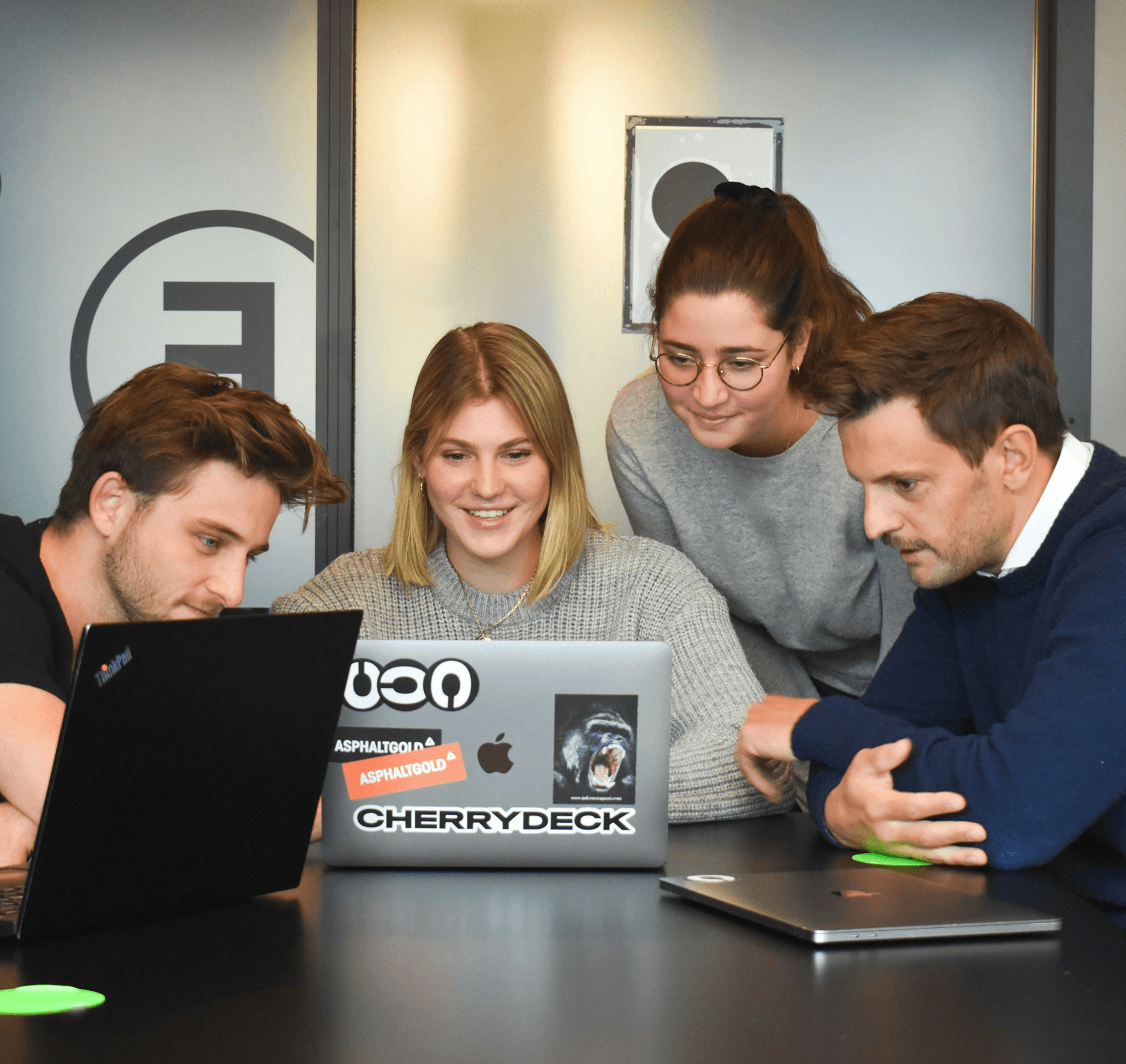 Zentexx Toronto product team collaborating on laptops in office