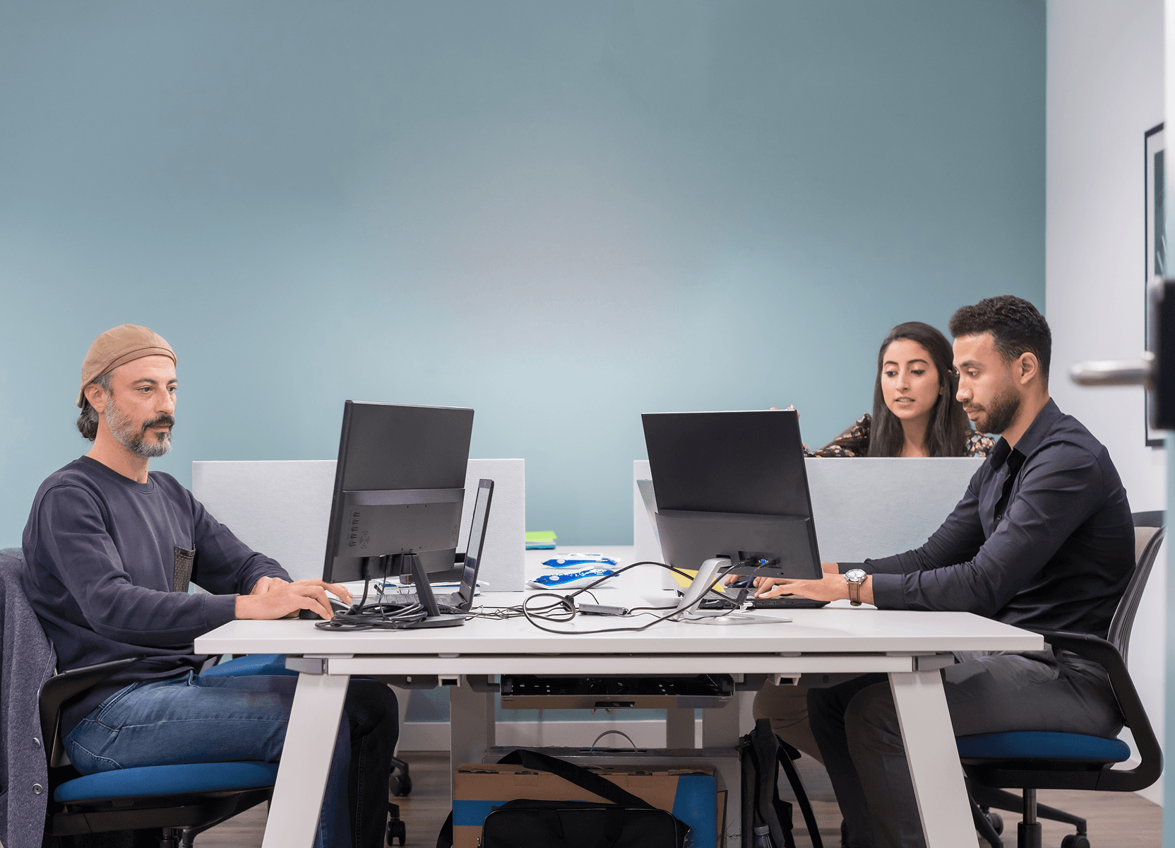 Software engineers working together as a staff extension team