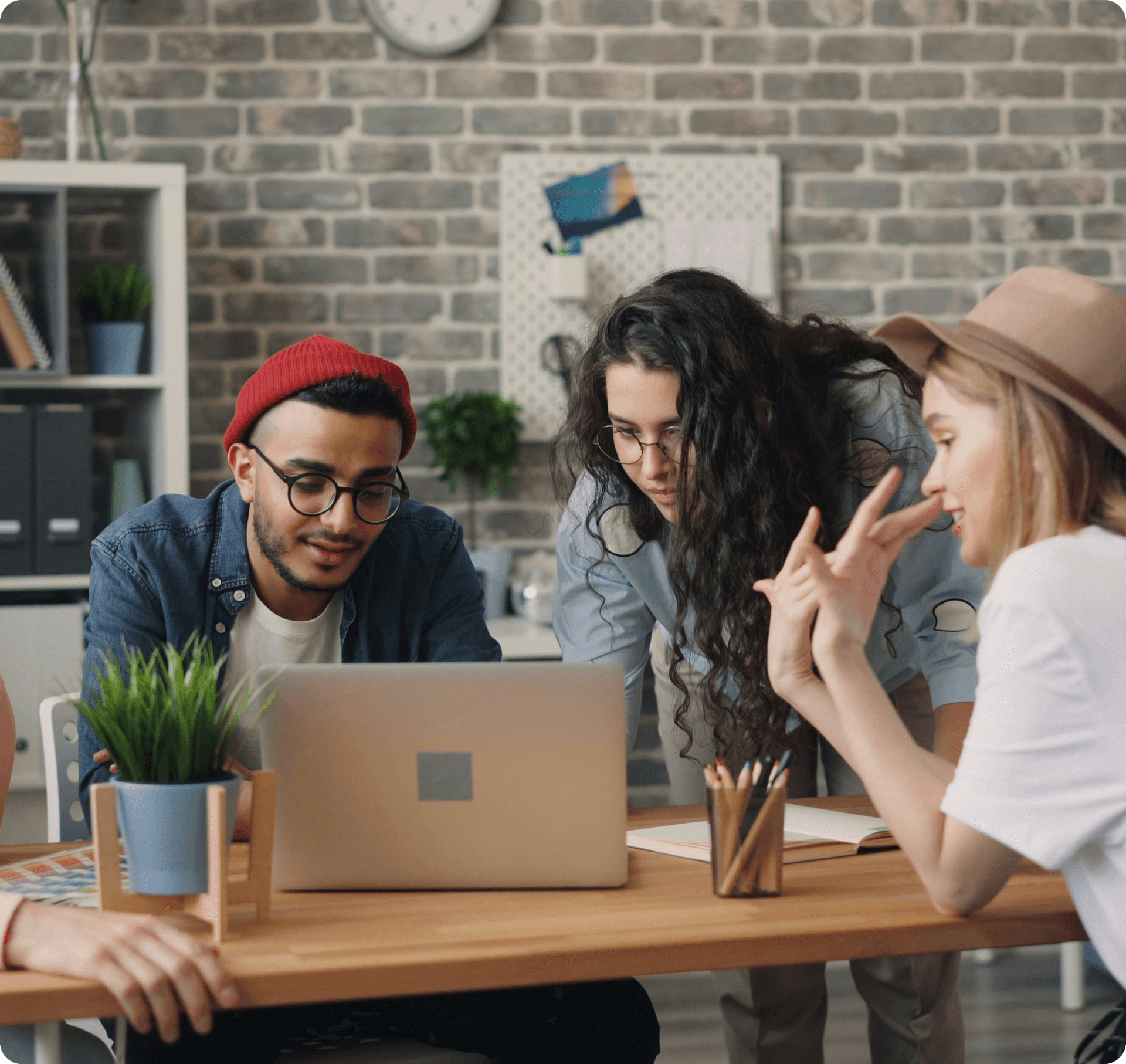 Zentexx Toronto product team collaborating on laptop in modern office